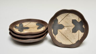 Set of four Dishes w/ Camino X's Pattern