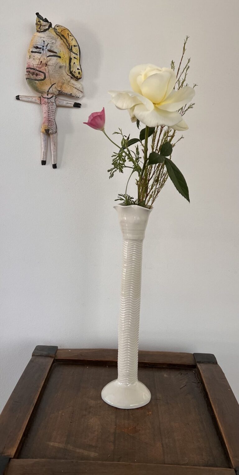 Sandy Simon vase/Brady figure